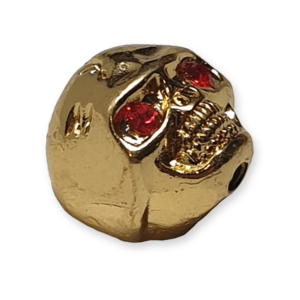 Kokko Skull knop, gold met red eyes